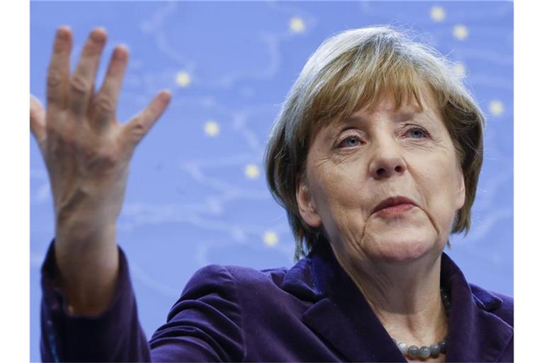 Angela Merkel hatte 2015 zusammen mit Frankreich bei den Verhandlungen zu einem Friedensplan für die Ostukraine vermittelt. (Archivbild). Foto: Olivier Hoslet/EPA/dpa
