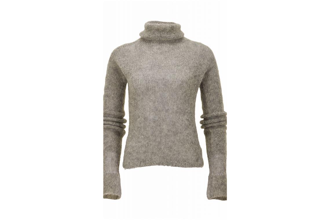 Auch Rachel Greens grauer Mohair-Pullover kam unter den Hammer. Jennifer Aniston alias Rachel trug in der Serie oft Rollkragen-Pullover.