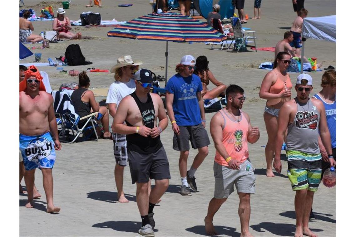 Zahl der Corona-Neuinfektionen in den USA steigt weiter Aus Deutschland zieht es Urlauber nach Mallorca, in den USA locken die Strände Floridas. Foto: Paul Hennessy/SOPA Images via ZUMA Wire/dpa