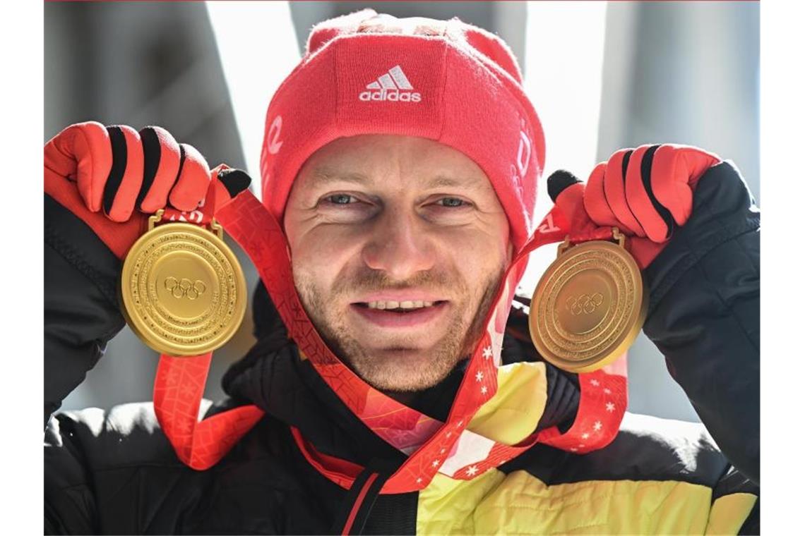 Doppeltes Double: Bob-Kaiser Friedrich schreibt Geschichte Bobpilot Francesco Friedrich hat in Peking zwei Goldmedaillen gewonnen. Foto: Robert Michael/dpa-Zentralbild/dpa