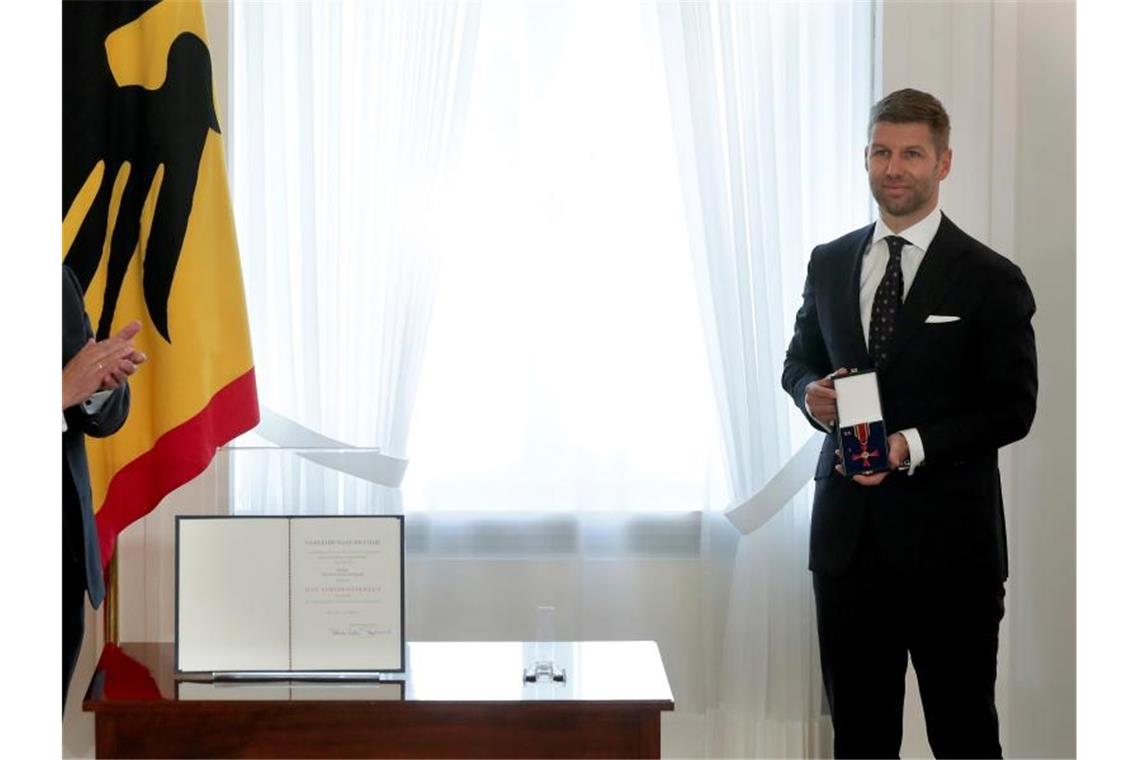 Bundesverdienstkreuz für Ex-Nationalspieler Hitzlsperger Bundespräsident verleiht Verdienstorden an Thomas Hitzlsperger. Foto: Michael Sohn/POOL AP/dpa/Archivbild