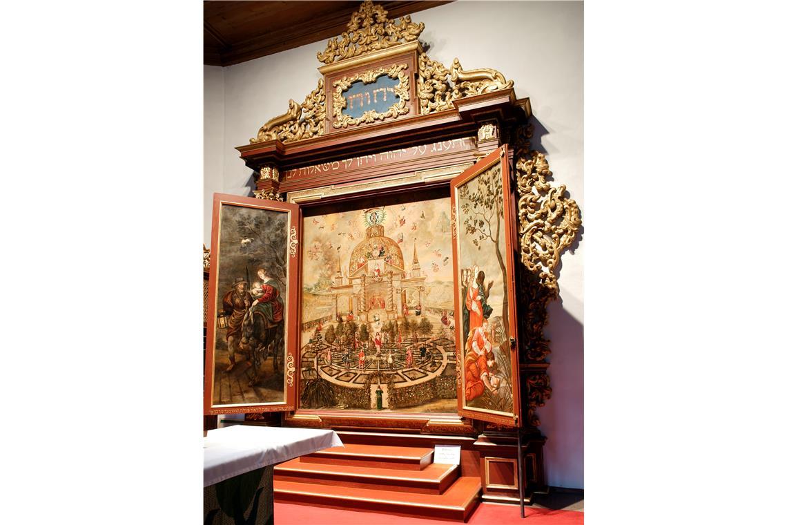 Der Altar in der evangelischen Kirche in Bad Teinach zeigt die detailreiche Darstellung eines Paradiesgartens. Foto: Ewald Freiburger, J.S. Klotz Verlagshaus Neulingen