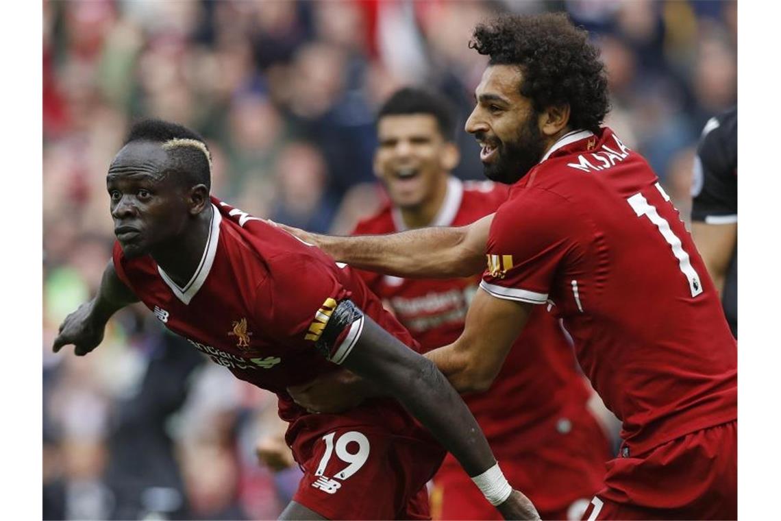 Das Finale der Stürmer: „Fab Three“ gegen Kane und Co. Der FC Liverpool setzt auf die Tore von Sadio Mané (l) und Mohamed Salah. Foto: Martin Rickett/PA Wire