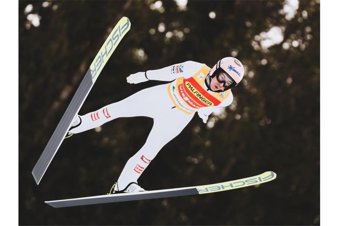 Rekordjagd auf Riesenanlage: So funktioniert die Skiflug-WM Der Österreicher Stefan Kraft hält mit 253,5 Metern den Weltrekord im Skifliegen. Foto: -/APA/EXPA/JFK/dpa/Archivbild