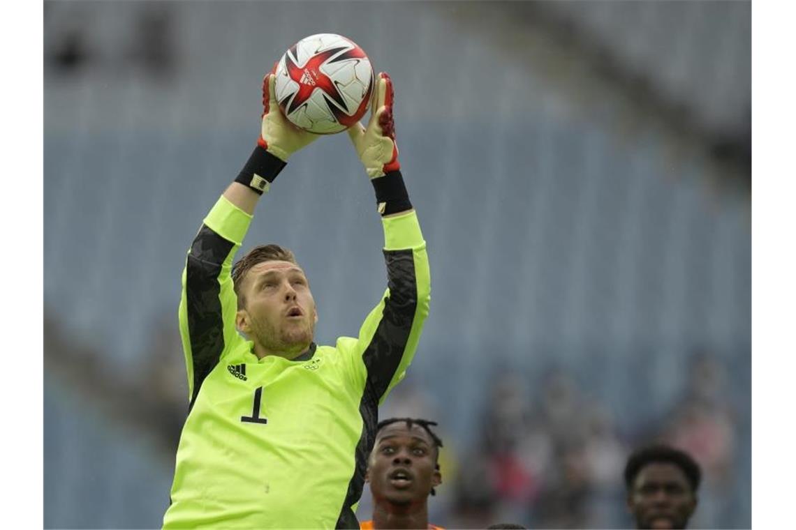 Deutschlands Torhüter Florian Müller fängt den Ball ab. Foto: Andre Penner/AP/dpa