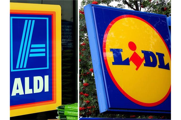 Die Bildkombo aus undatierten Archivbildern zeigt die Logos der deutschen Discounter Aldi (l) und Lidl in Großbritannien. Foto: Pa/PA Wire/dpa/Archivbild