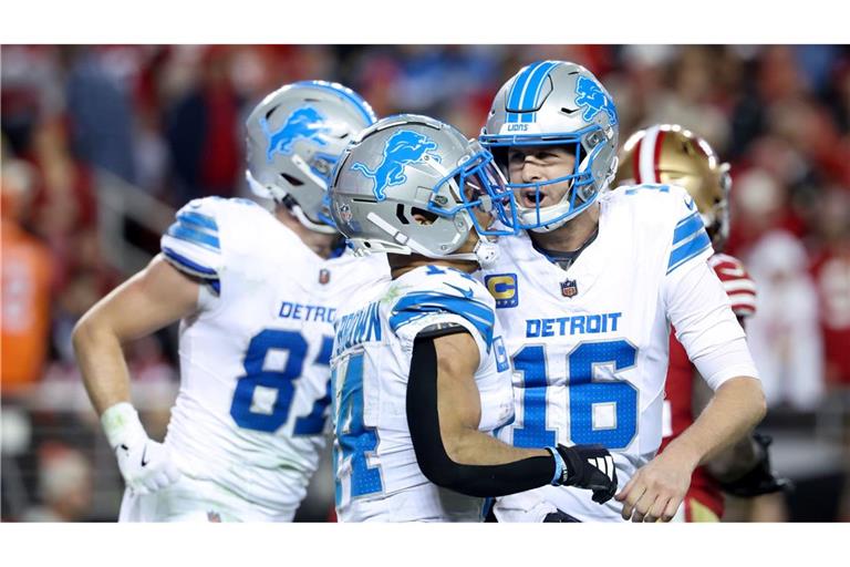 Die Detroit Lions um Quarterback Jared Goff (r.) und Wide Receiver Amon-Ra St. Brown spielen die beste Saison ihrer Geschichte.