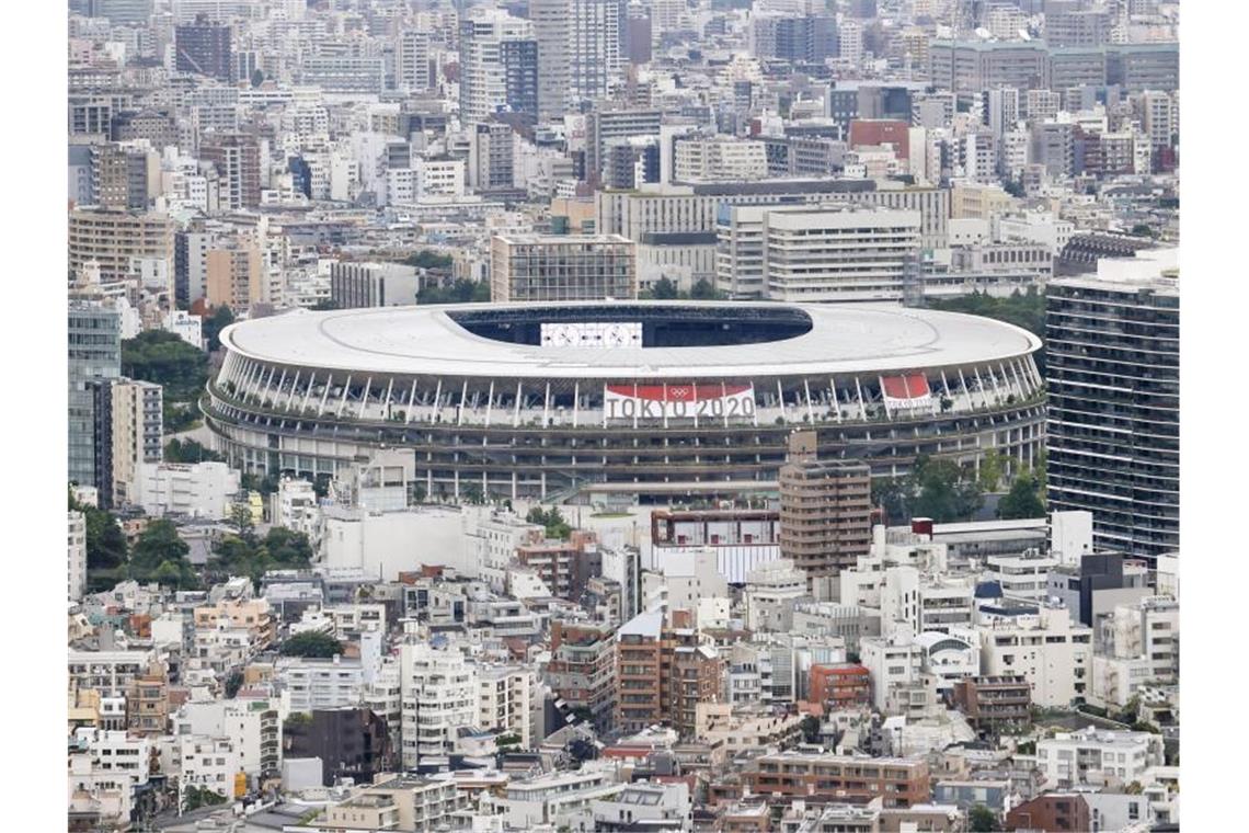 Olympisches Rekordprogramm: Die Höhepunkte der Tokio-Spiele Die Eröffnungsfeier im weitgehend leeren Olympiastadion steht unter dem Motto „Vereint durch Emotionen“. Foto: ---/kyodo/dpa