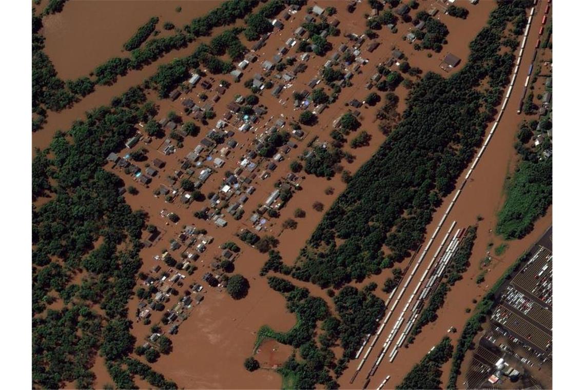 Dutzende Tote nach Hurrikan „Ida“ und Starkregen in den USA Ein Satellitenbild zeigt das besonders von Überflutungen betroffene Manville in New Jersey. Foto: Uncredited/Maxar Technologies/AP/dpa