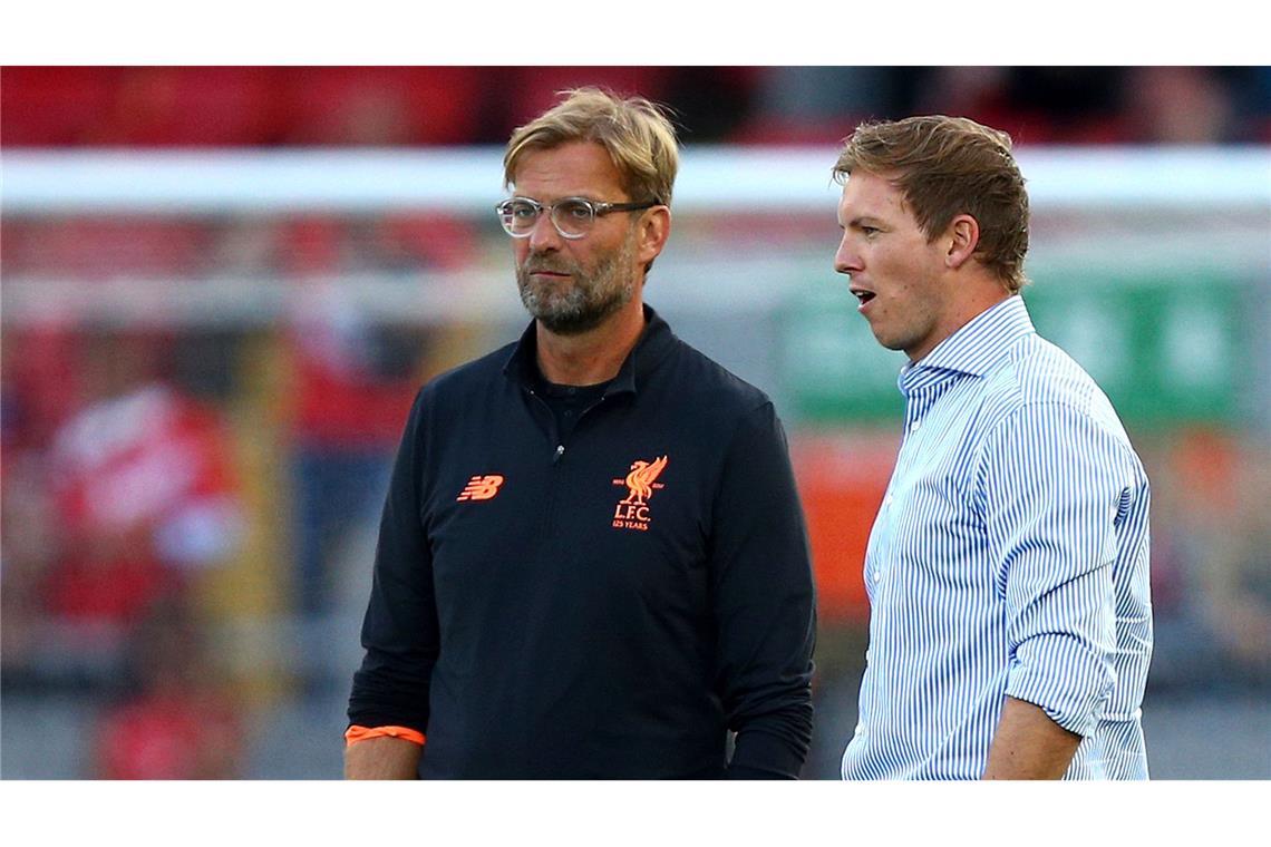 Einst Vereinstrainer, jetzt nicht mehr: Jürgen Klopp und Julian Nagelsmann (r).