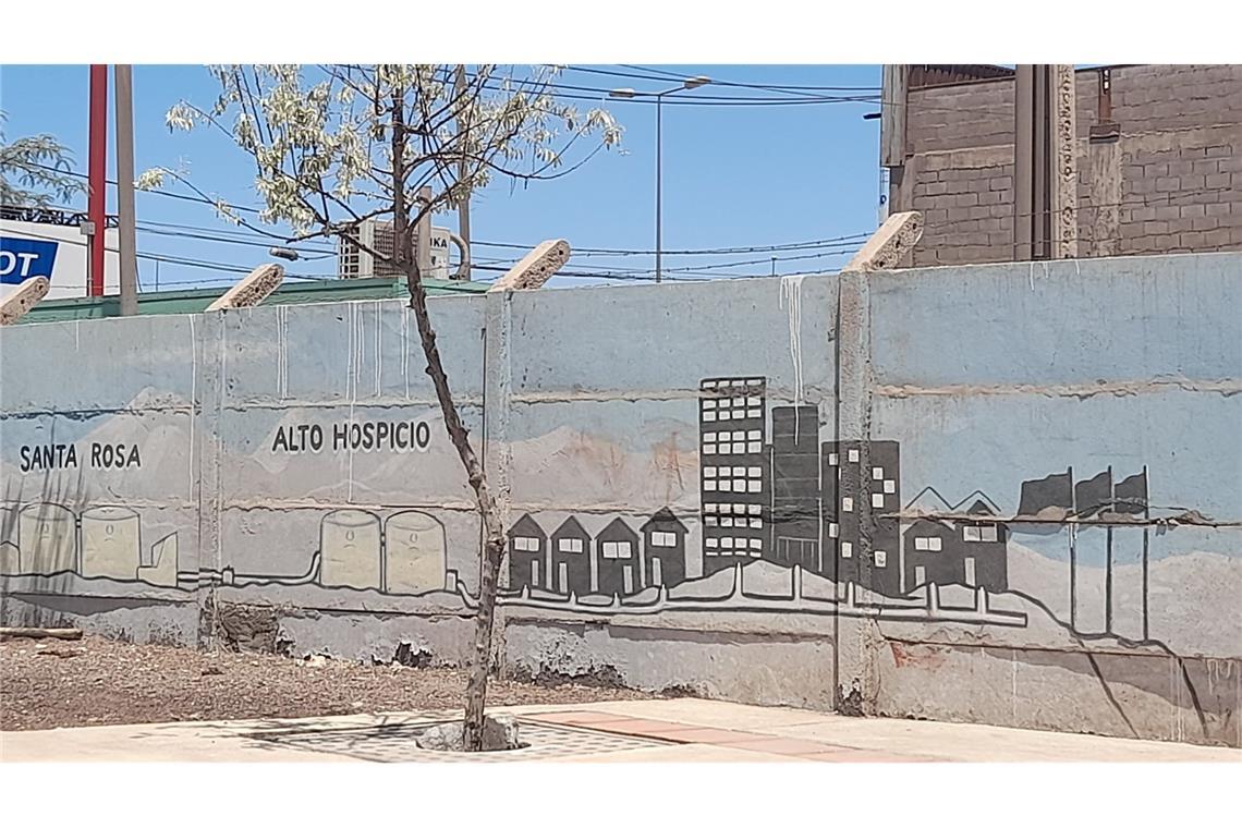 Graffiti in Alto Hospicio, das zeigt, wie die Stadt derzeit mit Wasser versorgt wird.