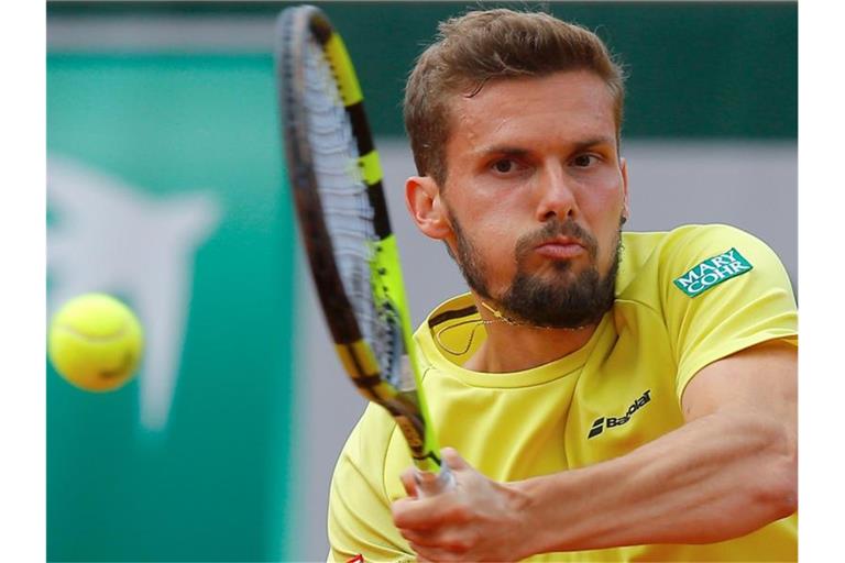 Hat beim Turnier in Köln Jan-Lennard Struff besiegt: Oscar Otte in Aktion. Foto: Michel Euler/AP/dpa