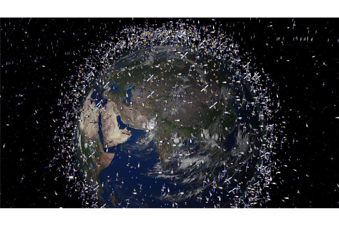 Hier überzeichnet dargestellt und doch real: Immer mehr Weltraumschrott kreist um die Erde. Auch die ISS-Batterie war dabei. Sie wurde im Jahr 2021 geplant abgestoßen.