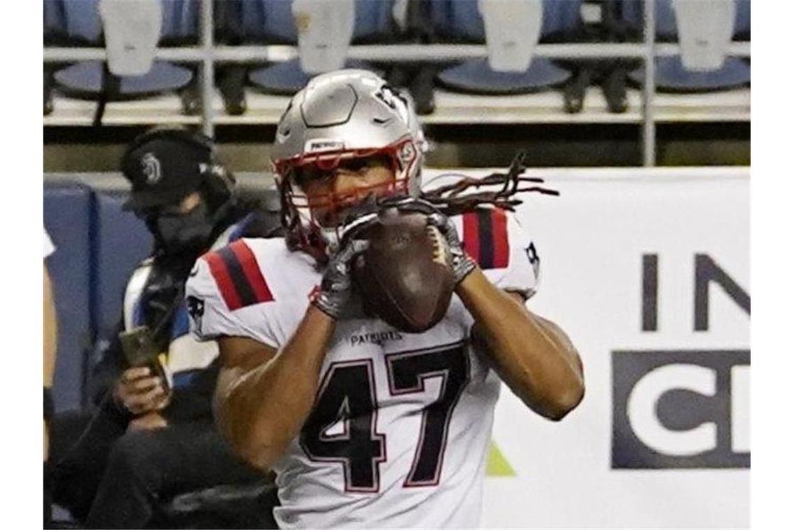 Patriots und Johnson unterschreiben Einjahresvertrag Jakob Johnson von den New England Patriots in Aktion. Foto: Elaine Thompson/AP/dpa/Archivbild