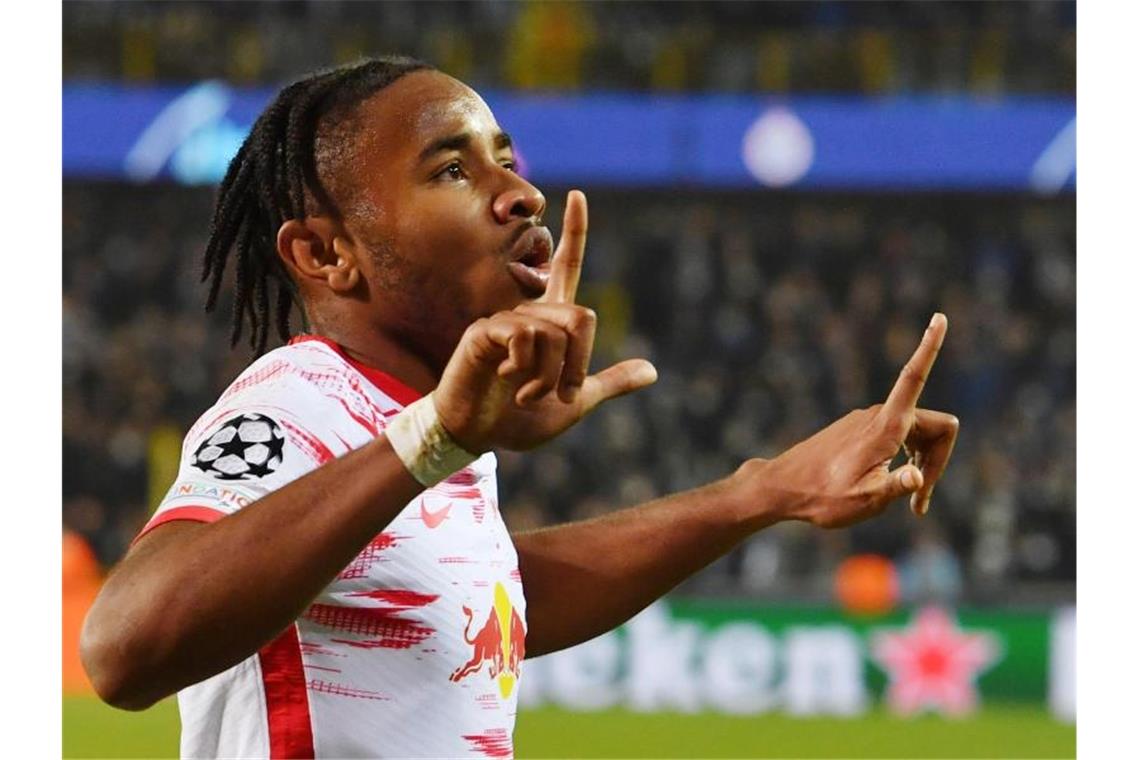 Starke Leipziger Notelf wahrt Chance auf Europa League Leipzigs Christopher Nkunku jubelt über seinen zweiten Treffer im Spiel, das 5:0 gegen die Gäste. Foto: Bernd Thissen/dpa