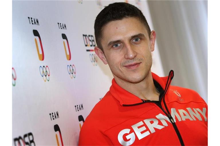 Marcel Goc, Kapitän der Deutschen Eishockey Nationalmannschaft, steht bei einer Pressekonferenz. Foto: Karl-Josef Hildenbrand/dpa/Archivbild