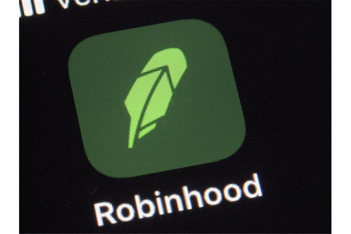 Robinhood zahlt 70 Millionen Dollar wegen Regelverstößen Robinhood ist in die Schlagzeilen geraten. Foto: Patrick Sison/AP/dpa