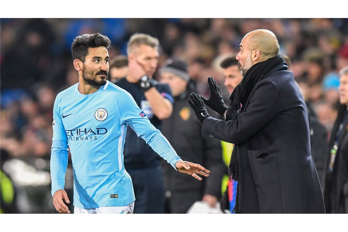 Wieder vereint: Ilkay Gündogan (l) und Pep Guardiola.